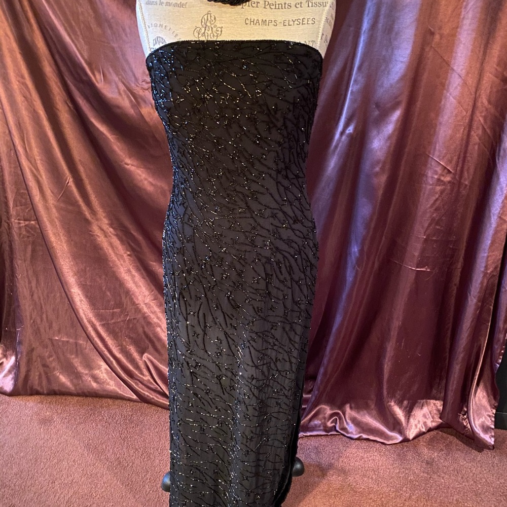 Black strapless sequin dress with slit in back